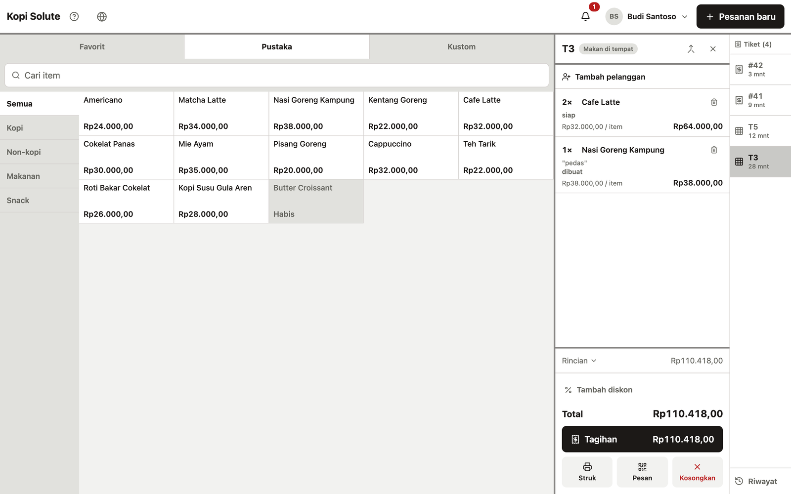 Solute register with the item grid on the left and an open table ticket, line items, and bill total on the right